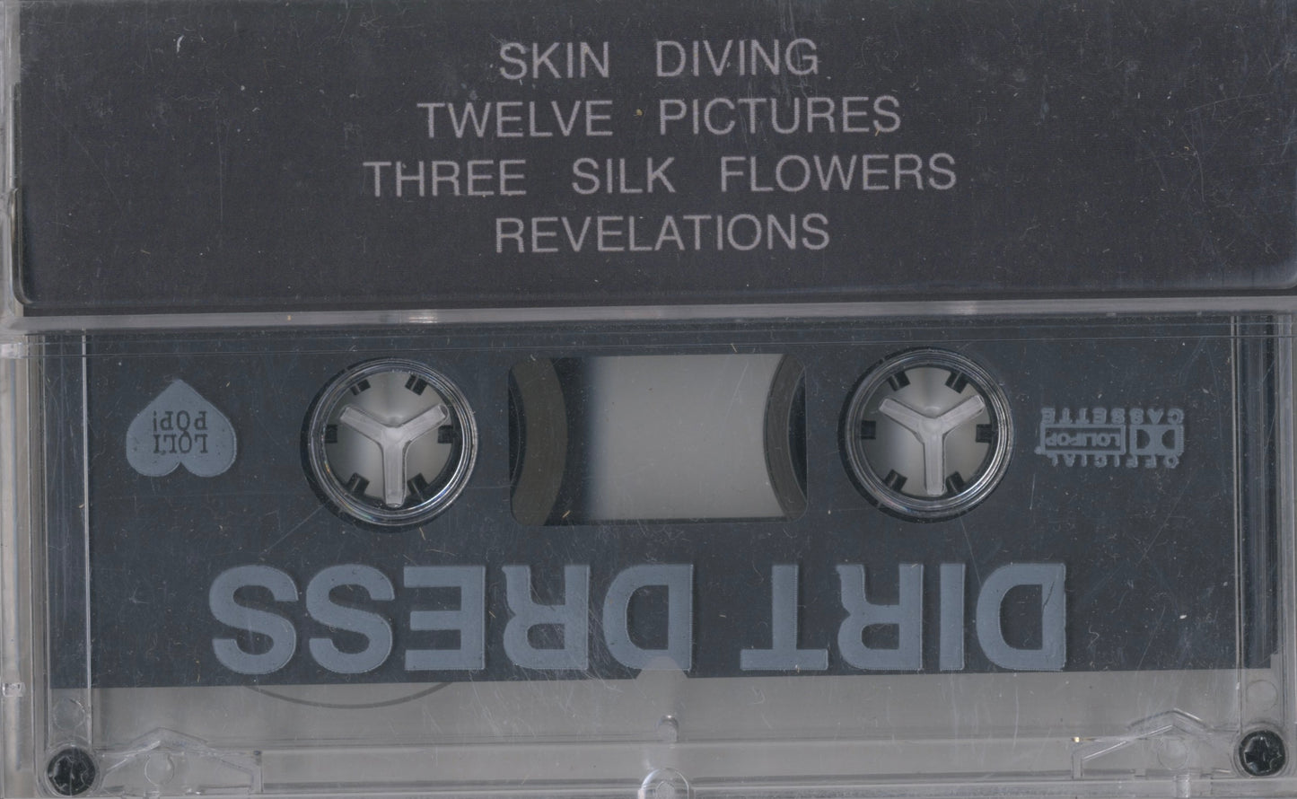 Reverse sleeve of Dirt Dress’s Revelations cassette — four songs of post-punk introspection, Los Angeles 2015.