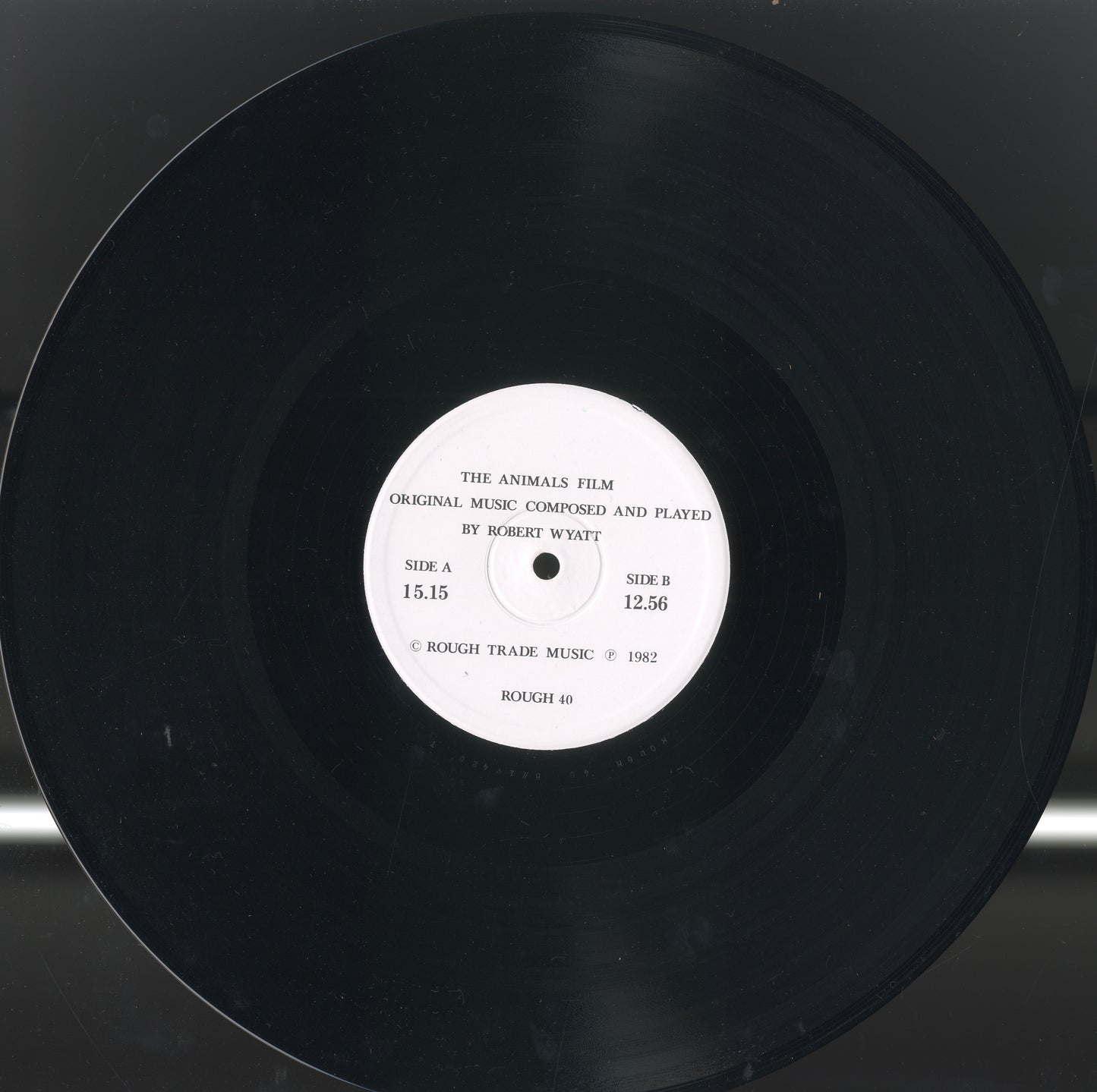 Detail of Side A and Side B labels from Robert Wyatt’s The Animals Film — Italian 1982 pressing, released by Base Records.
