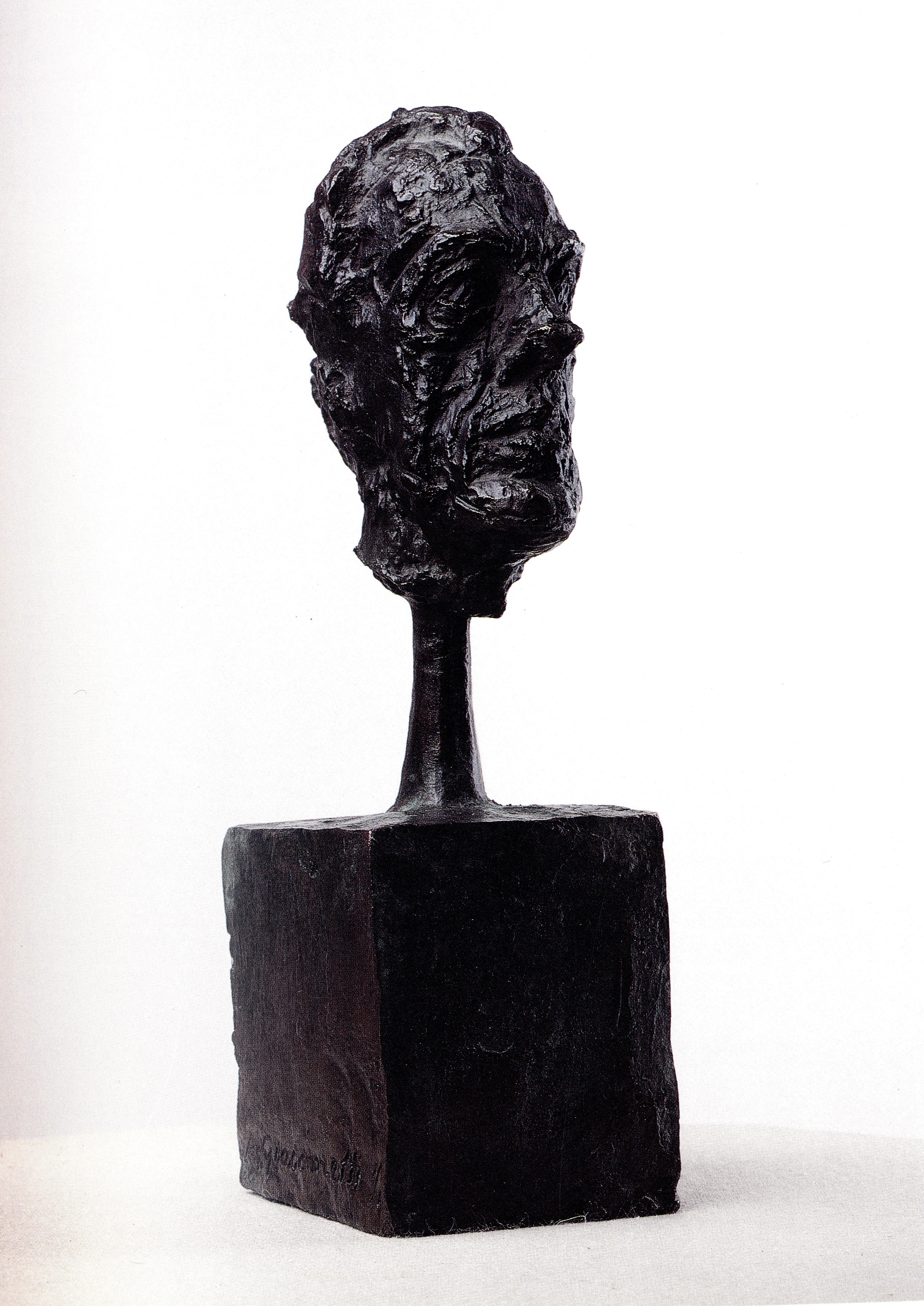 Interior spread featuring artwork reproductions from the 1997 Giacometti exhibition catalog.