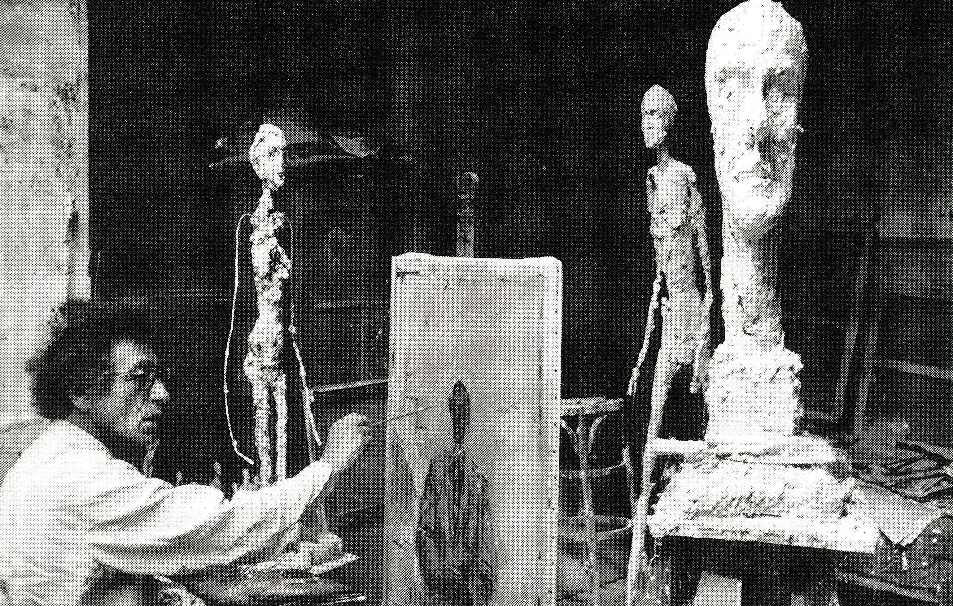 Interior spread highlighting drawings and archival material by Giacometti.