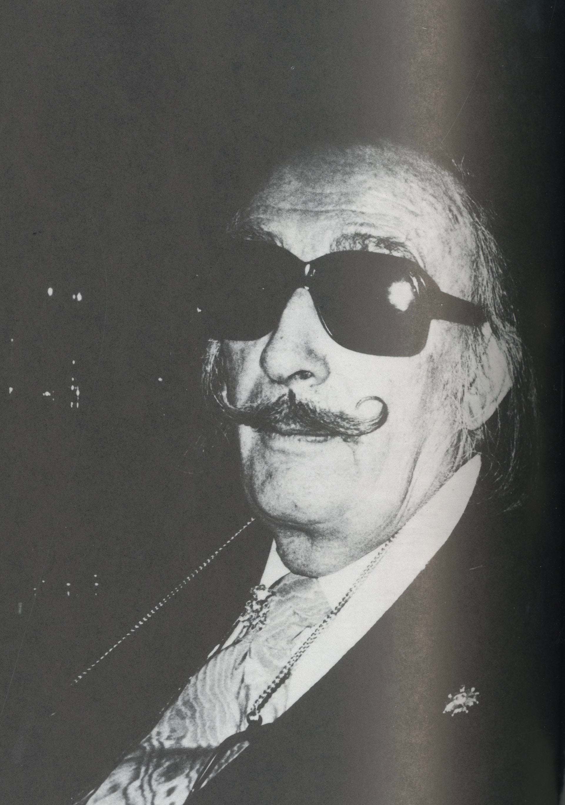 Andy Warhol’s Exposures featuring candid portraits of Salvador Dalí and other iconic figures from the 1970s art and celebrity scene.