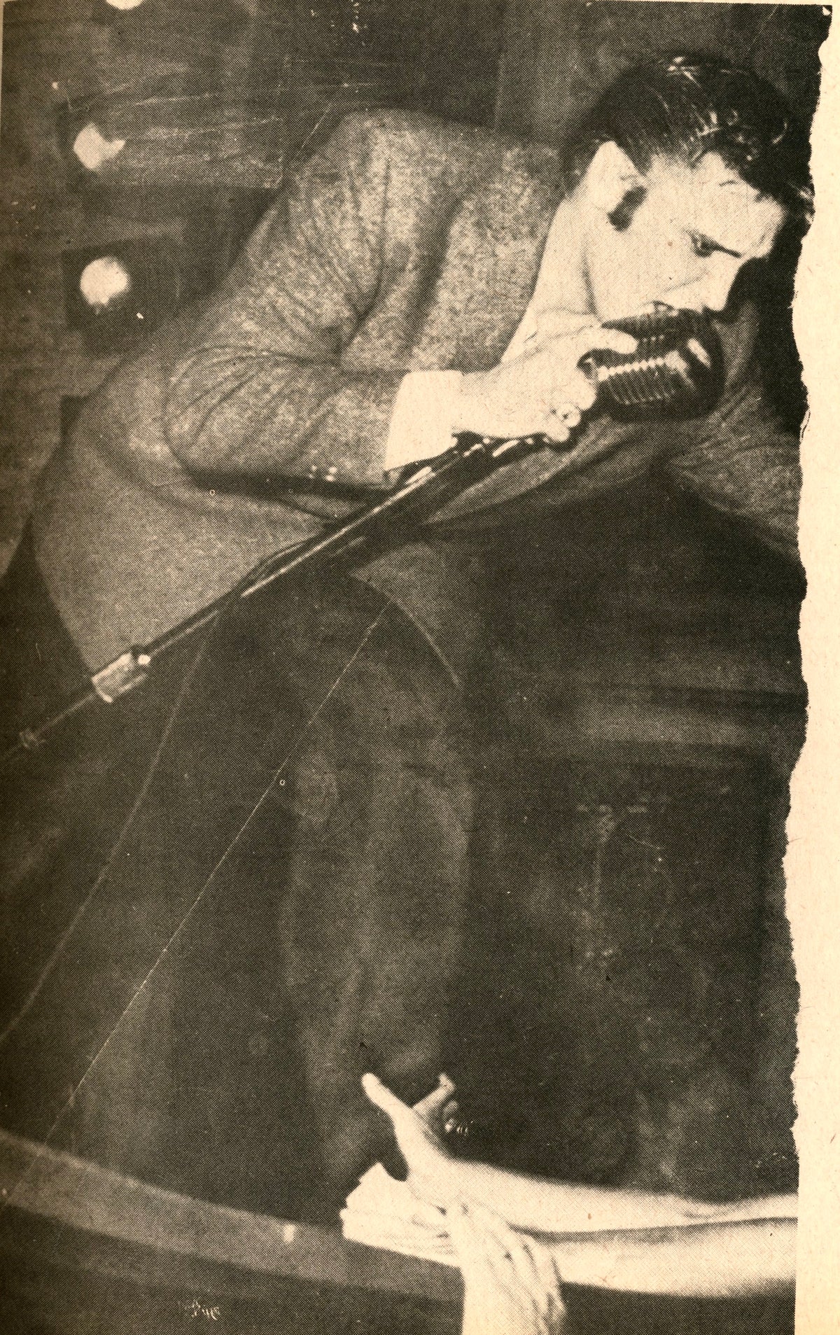 Page from Art-Rite No. 13: man in a suit with slicked-back hair leaning into a microphone, grainy black and white.