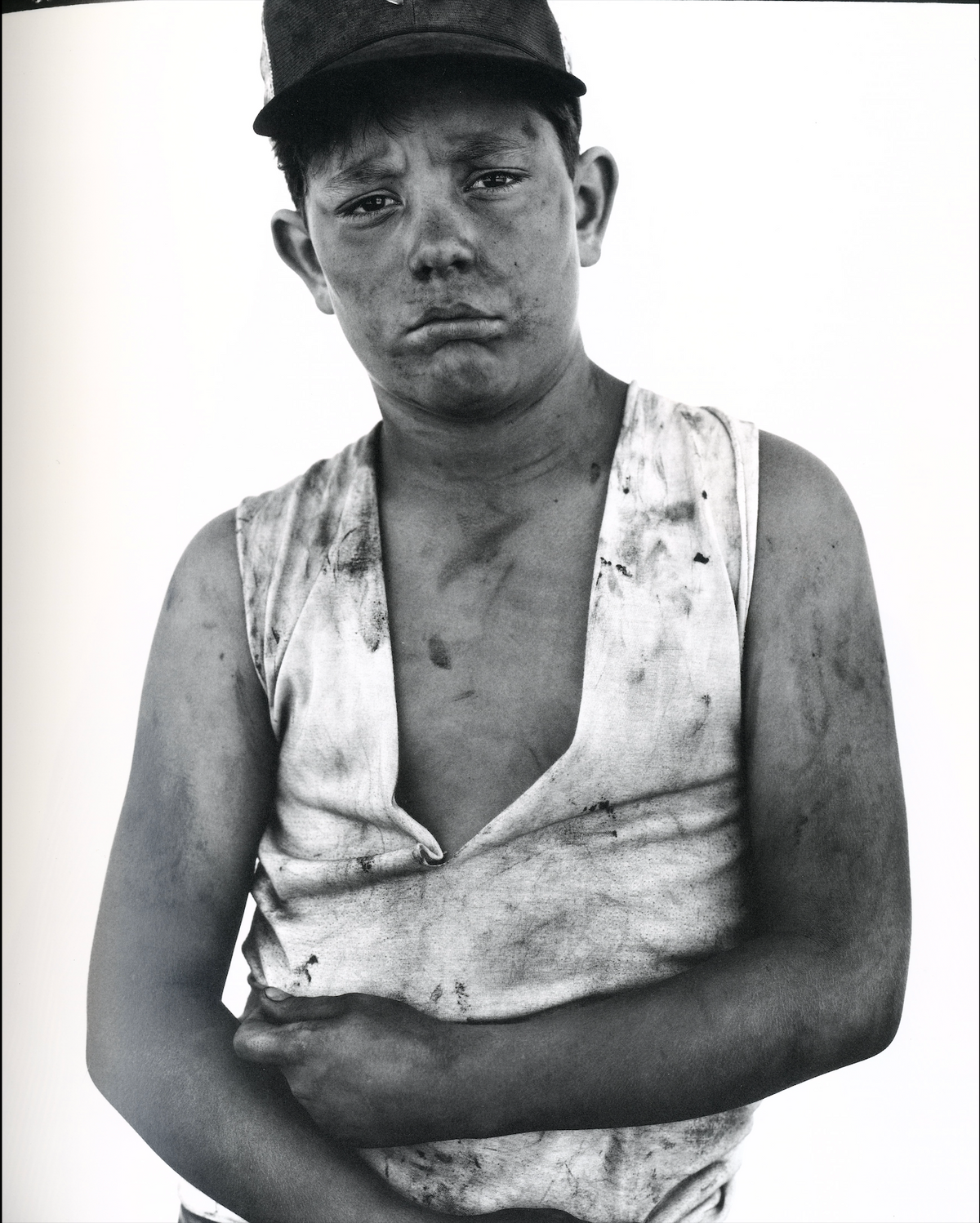 Richard Avedon In the American West interior young worker cap portrait white background rural America interior 4 intermission books.