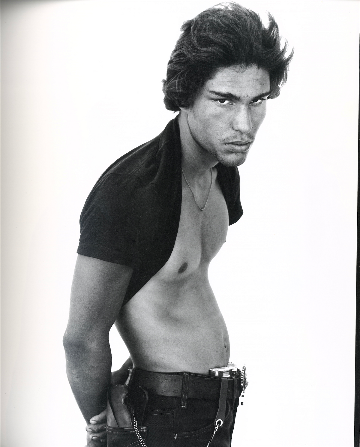 Richard Avedon In the American West interior drifter portrait open shirt white background black and white interior 5 intermission books.