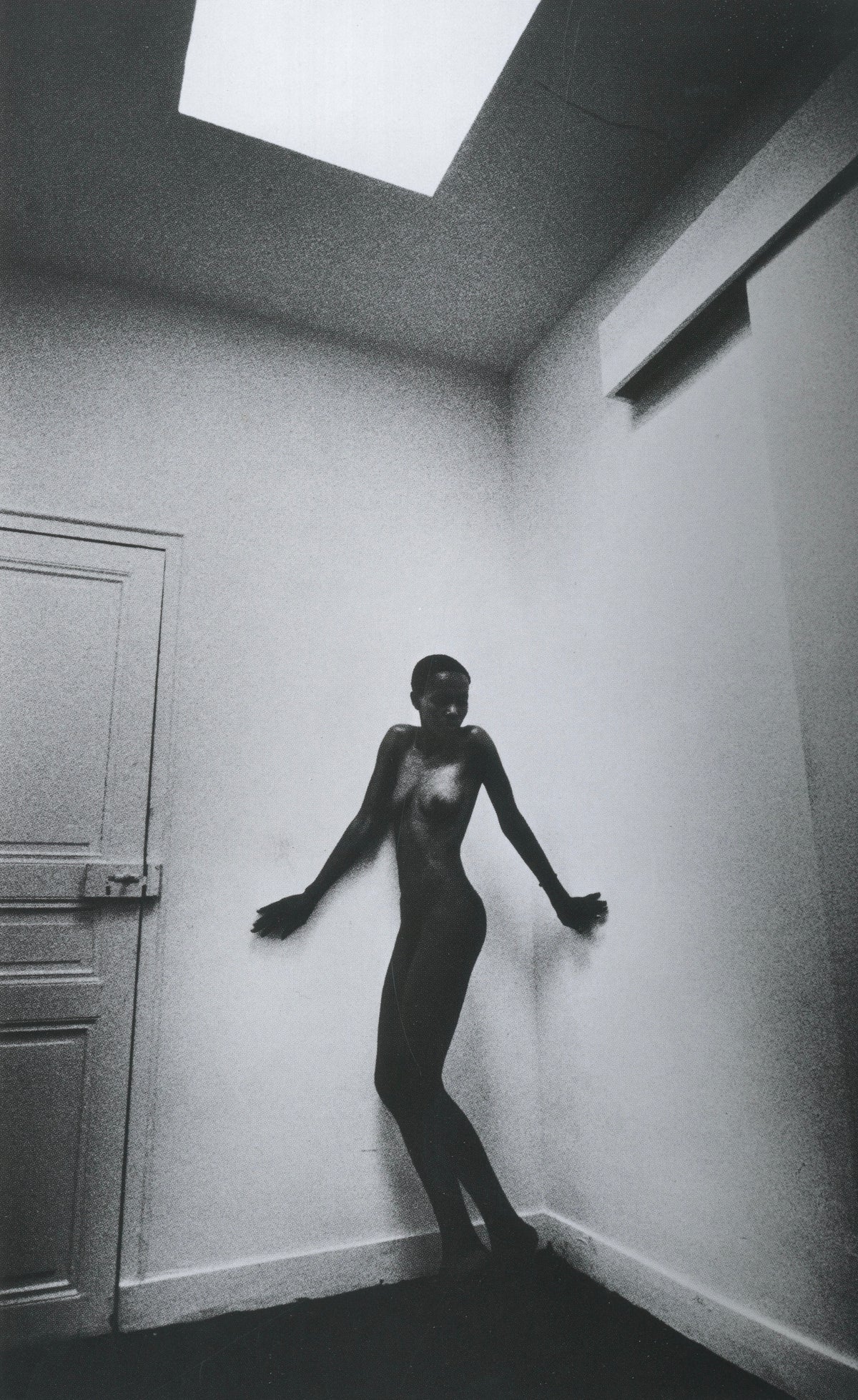 The Best Nudes 5 Jeanloup Sieff interior silhouette figure corridor overhead light wide angle interior 3 intermission books.