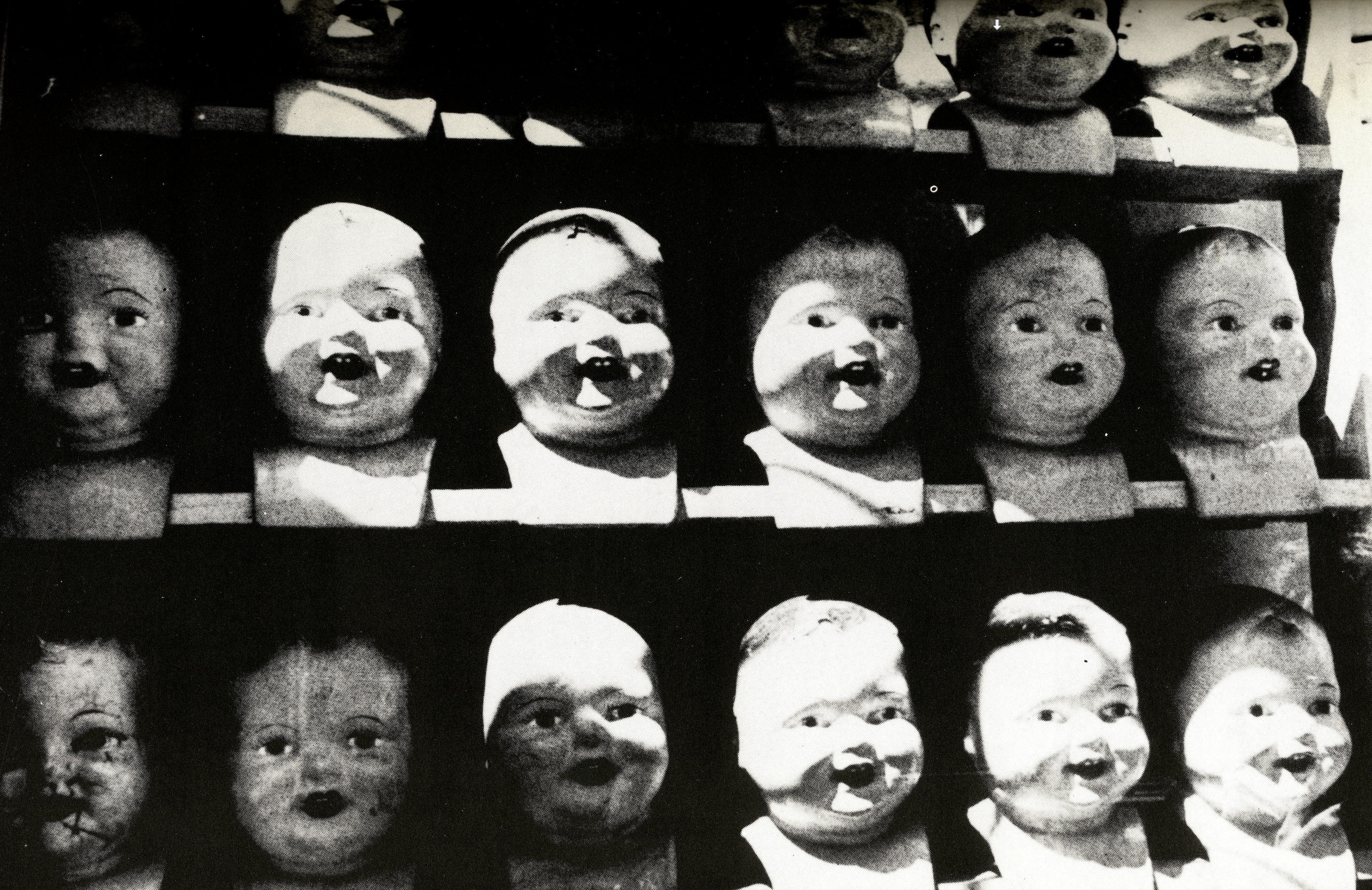 Spread featuring typography-heavy design with quotes from Eno.