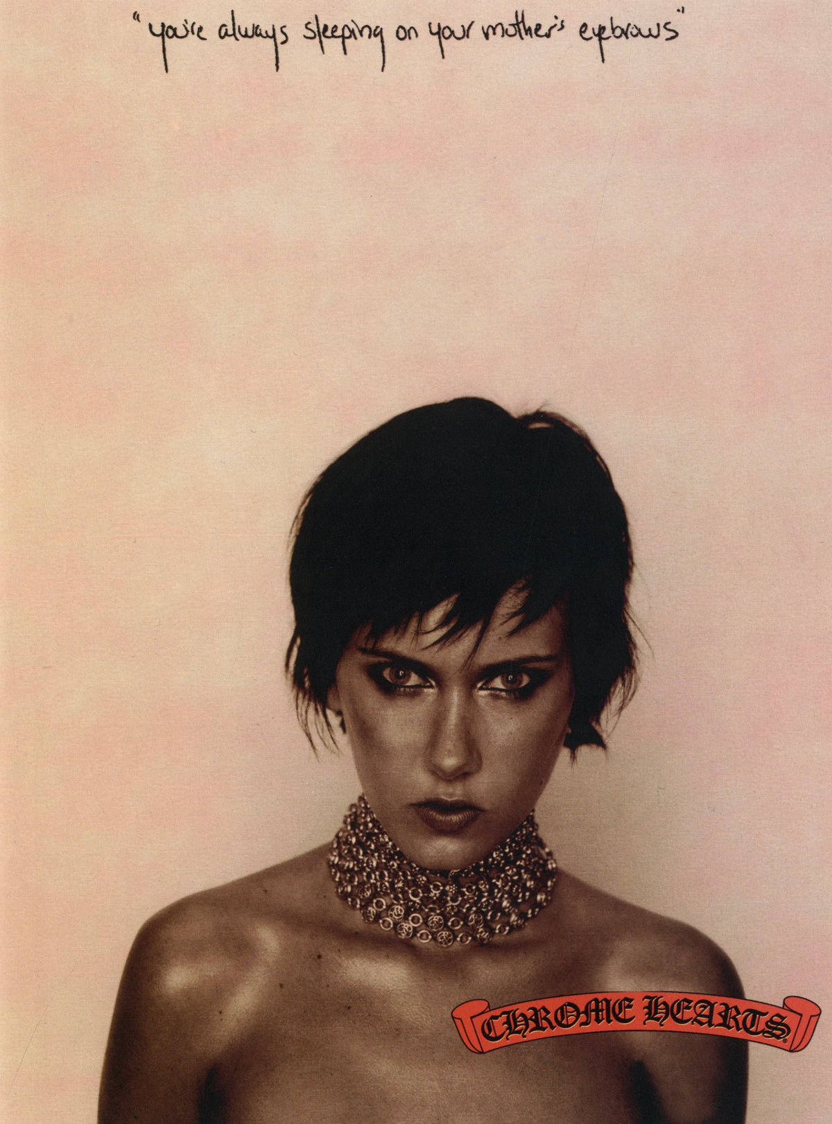 Portrait of a woman with short dark hair wearing a Chrome Hearts choker, Chrome Hearts Magazine Vol. 1.