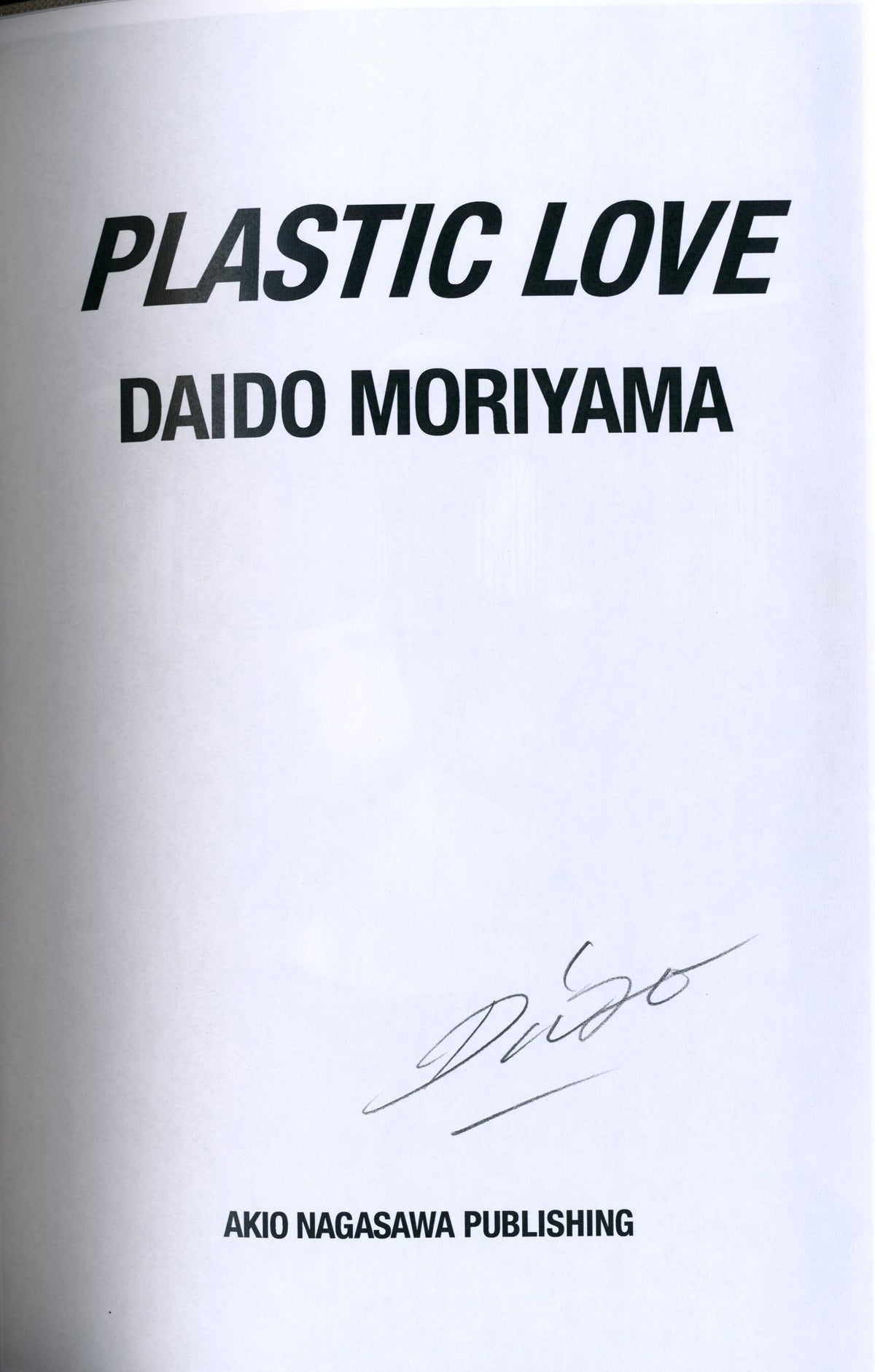 Title page of Plastic Love, Daido Moriyama, Akio Nagasawa Publishing, signed by the artist in pen.
