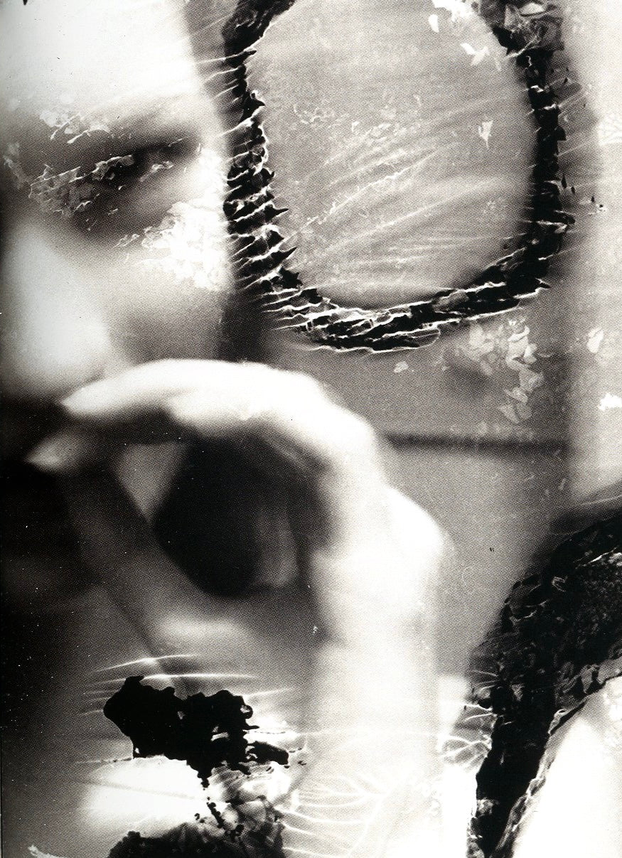 Damaged Negatives Glen Luchford interior figure smoking oxidation damage obscured face duotone interior 1 intermission books.