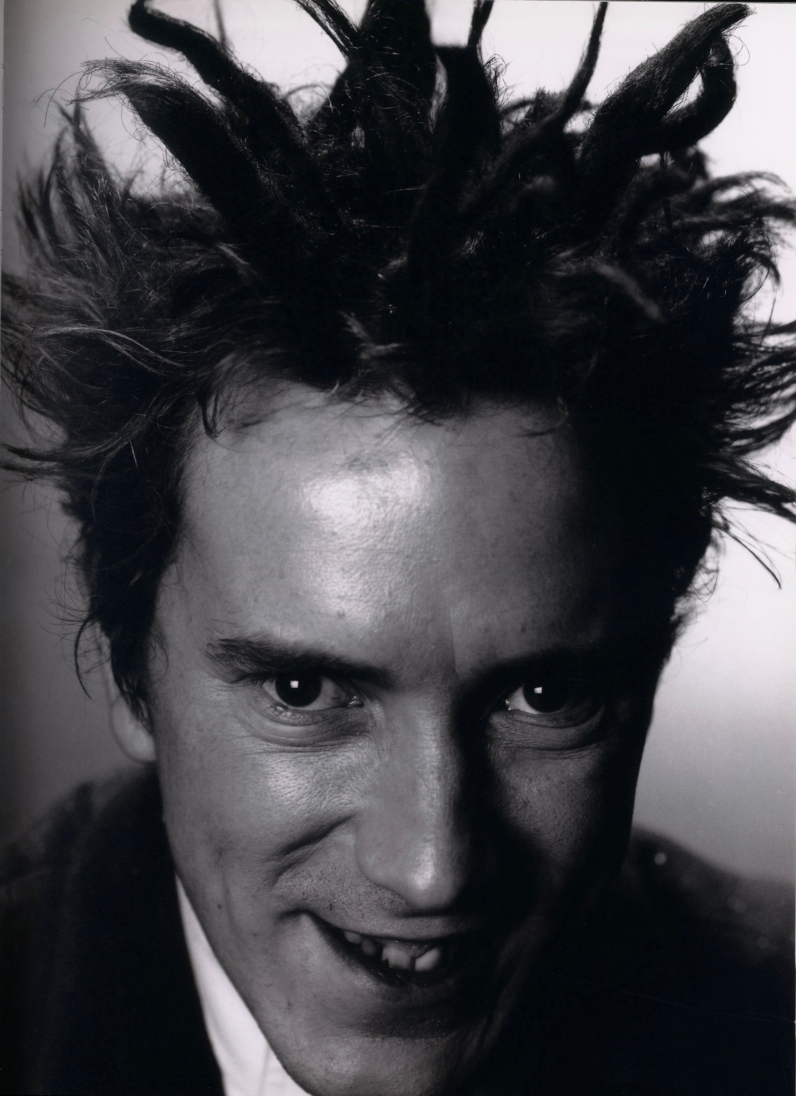 Interior spread with photographs of music legends from David Bailey’s archive.