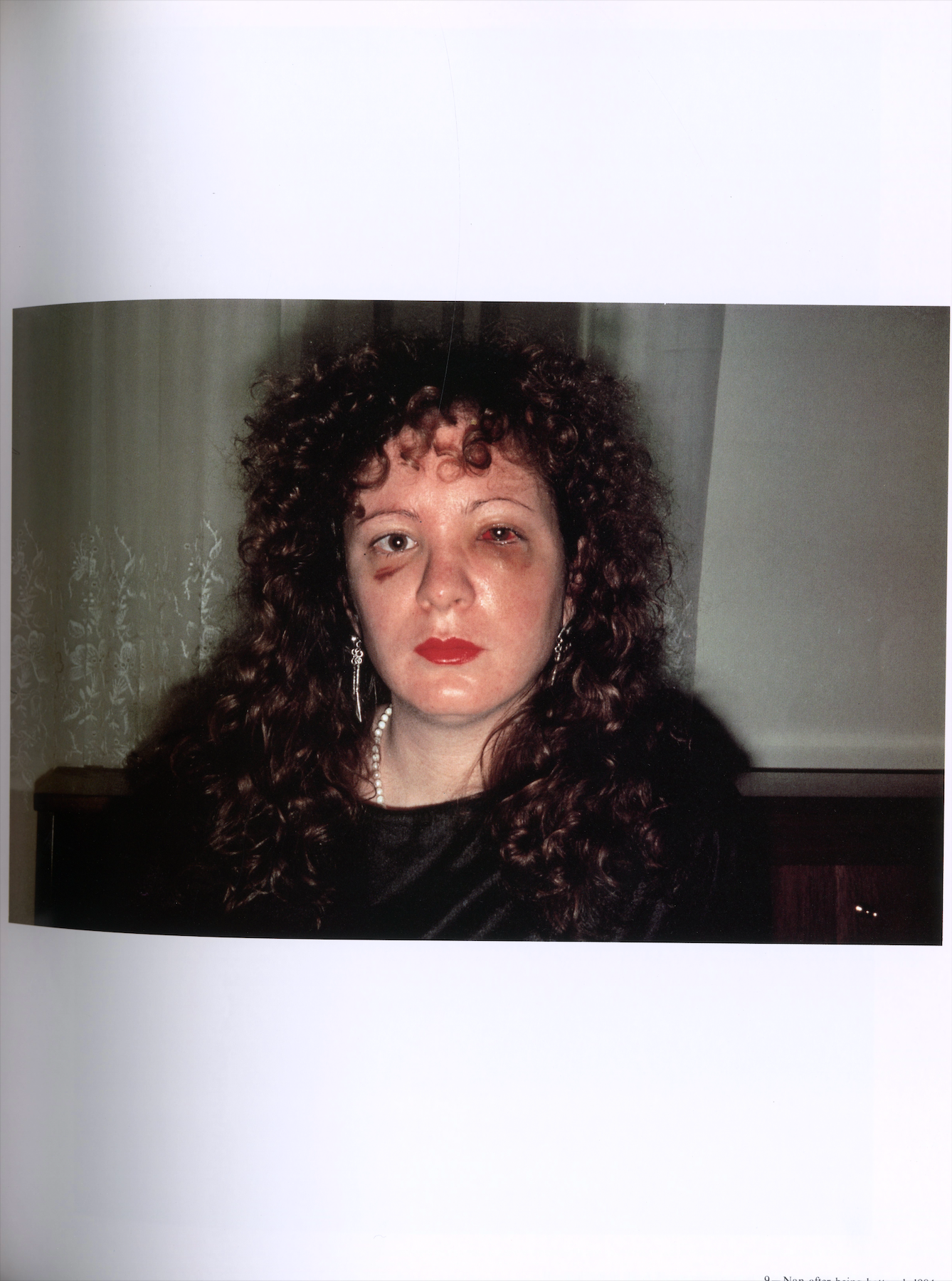 Deja-vu No 9 interior Nan Goldin self portrait woman seated color photography interior 5 intermission books.
