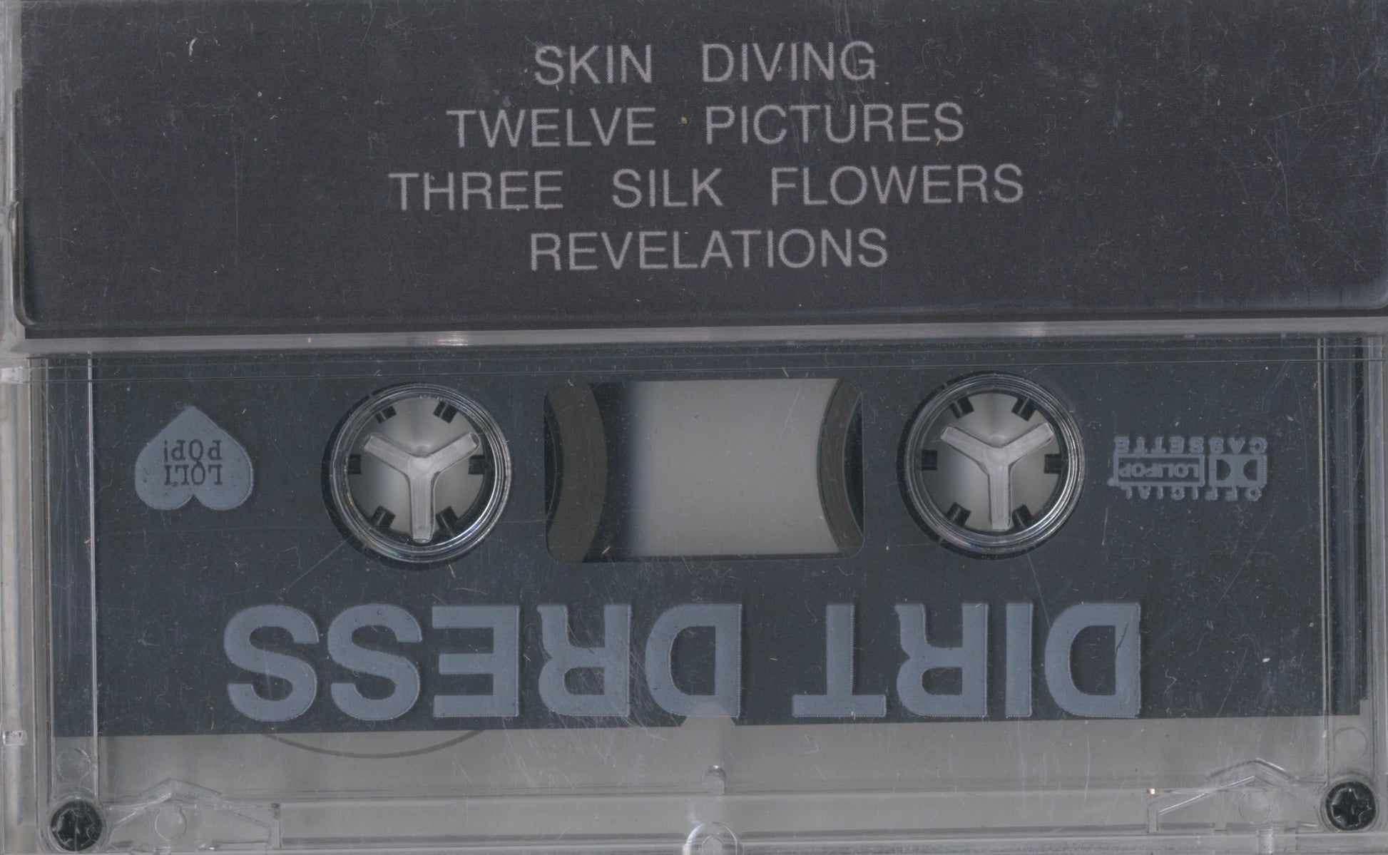 Reverse sleeve of Dirt Dress’s Revelations cassette — four songs of post-punk introspection, Los Angeles 2015.