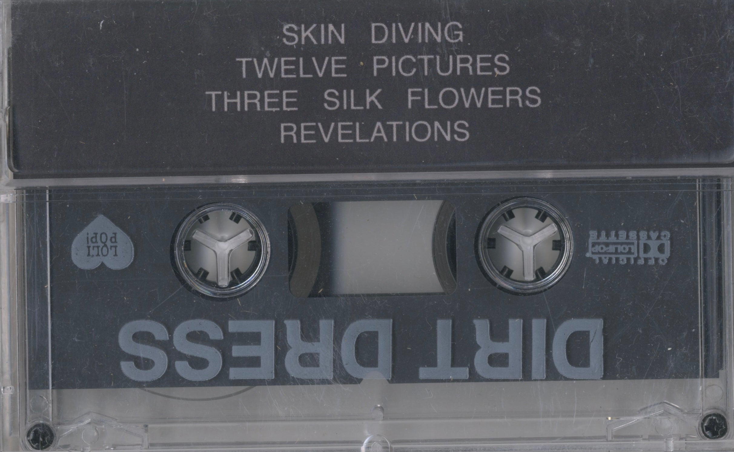 Reverse sleeve of Dirt Dress’s Revelations cassette — four songs of post-punk introspection, Los Angeles 2015.