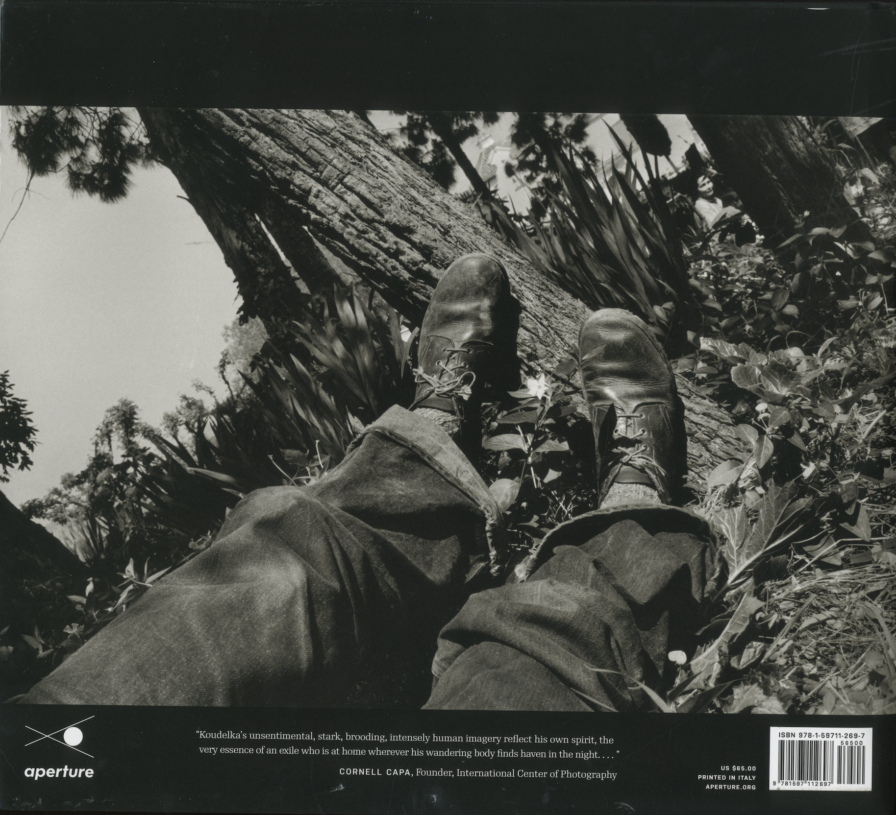 Back cover of Josef Koudelka’s “Exiles” Aperture 2014 edition, displaying publication details and subtle wear-free matte finish.