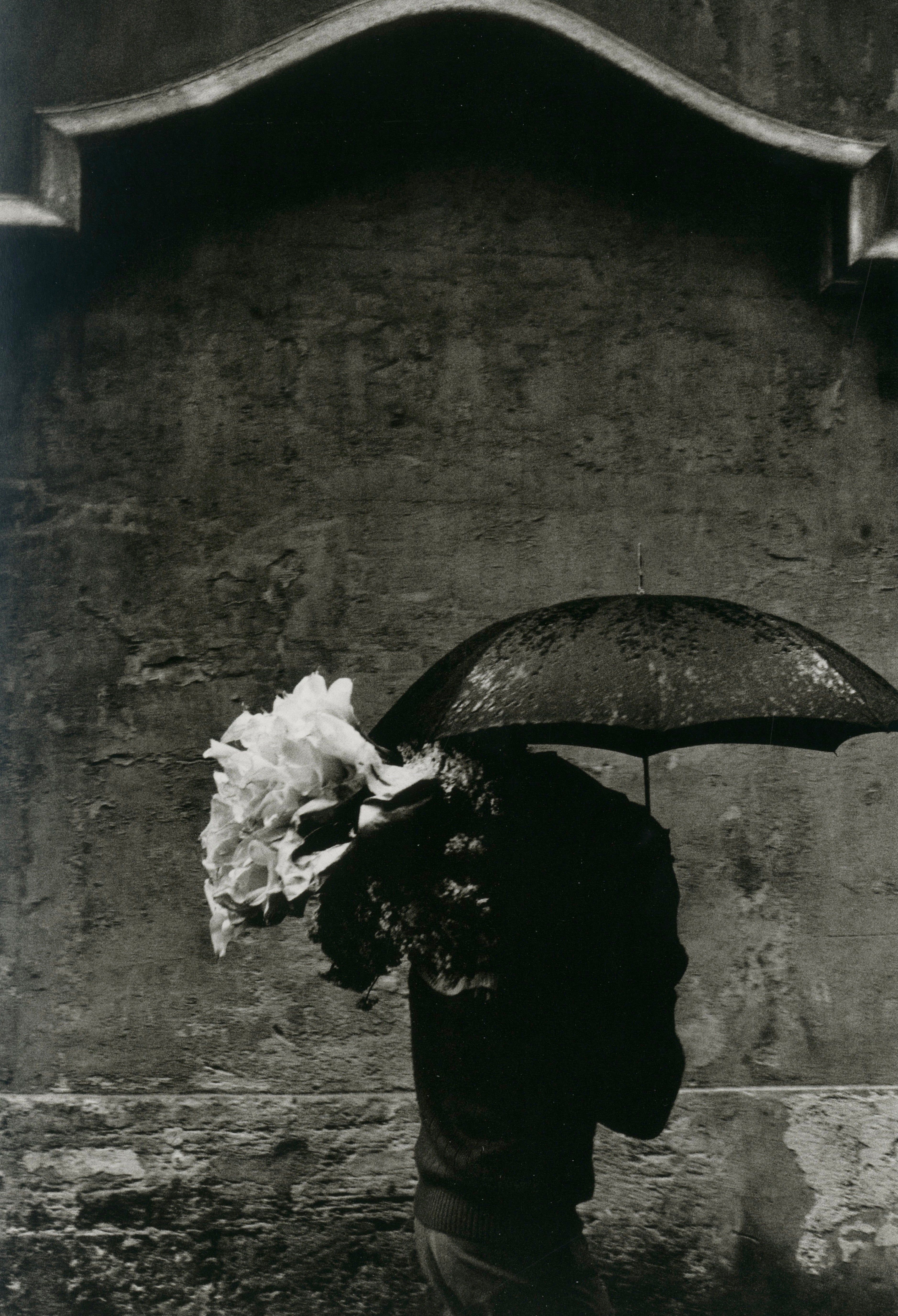 Inside page from “Exiles” by Josef Koudelka, featuring a dramatic documentary photograph from his years of wandering Europe.