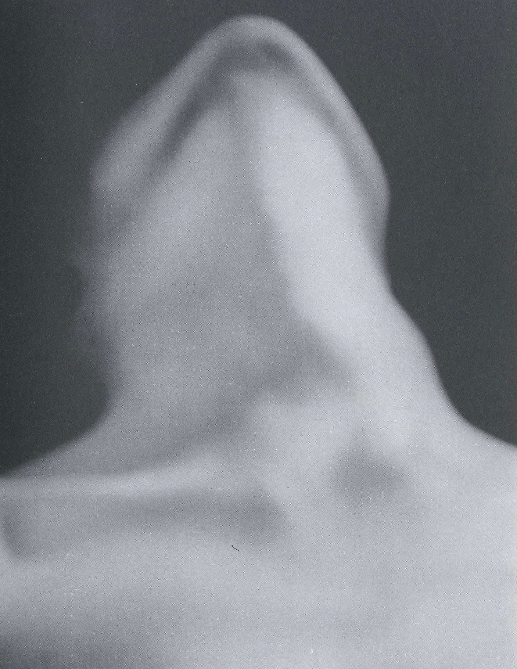Interior spread from Photographien Paris 1920–1934 featuring surrealist photography by Man Ray.