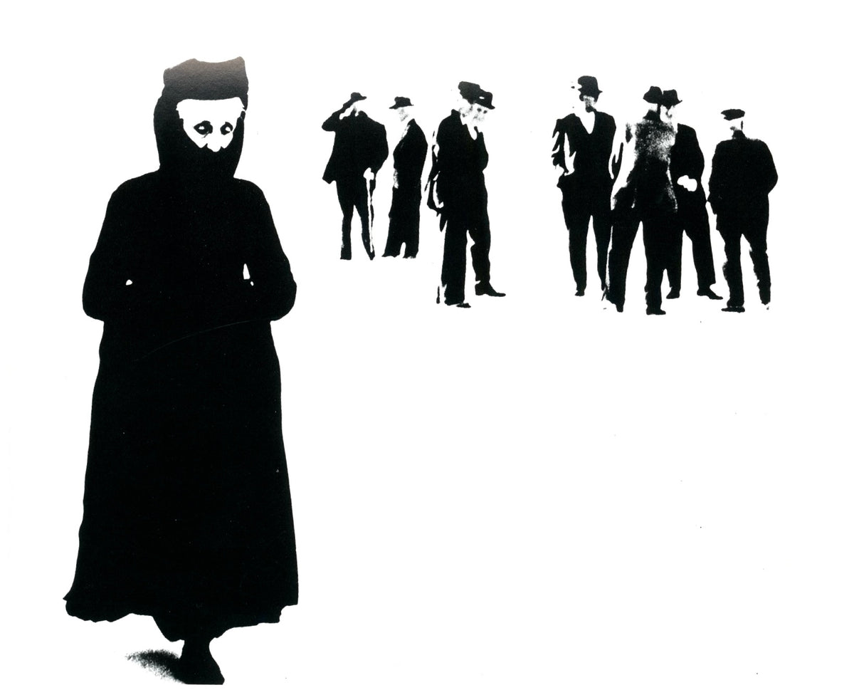 Photograph by Mario Giacomelli: a cloaked figure in black facing a row of men in dark suits against a white ground.