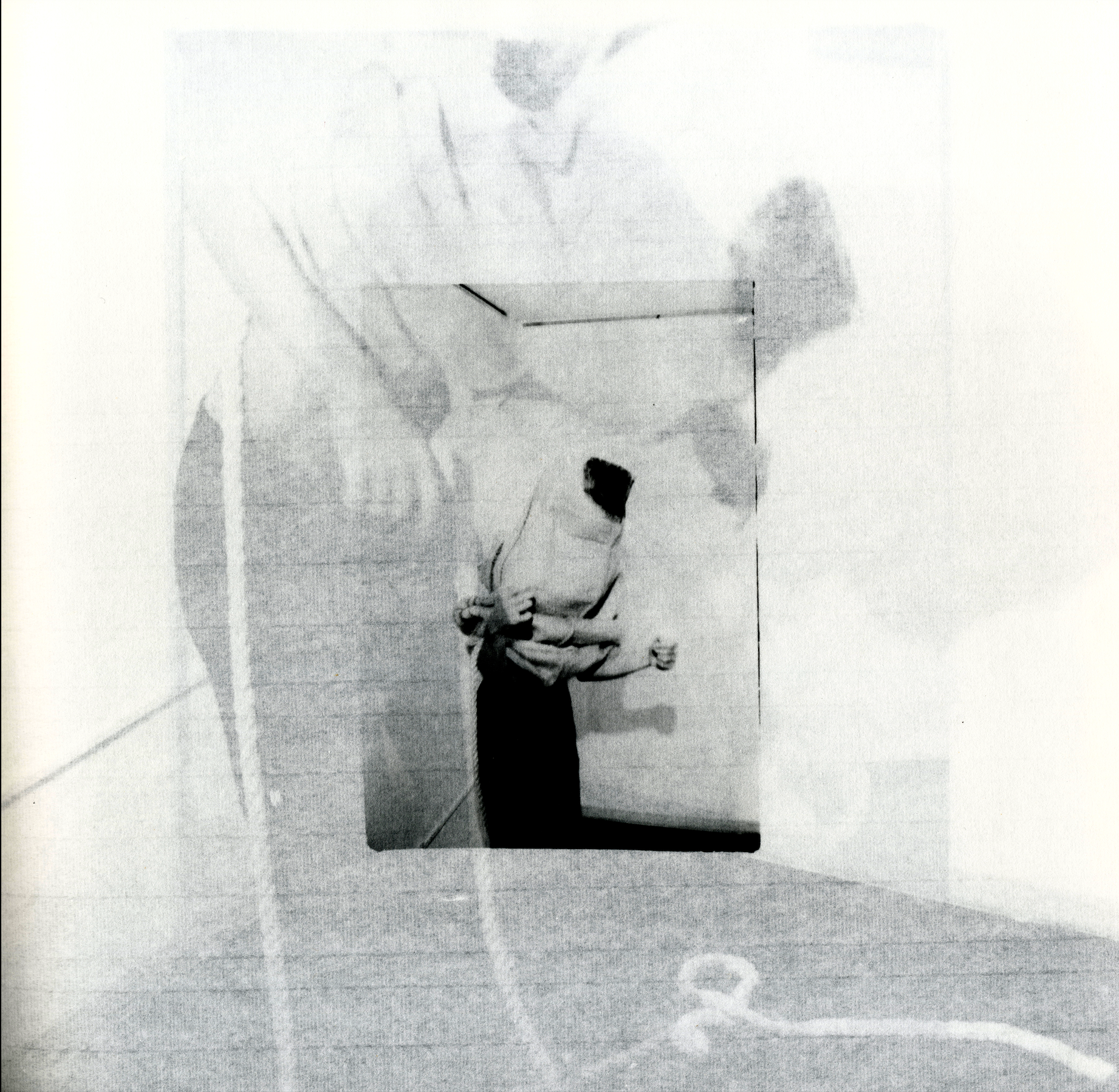 Detail shot of the textured linen cover of Guiones, embroidered with a single stylized eye.