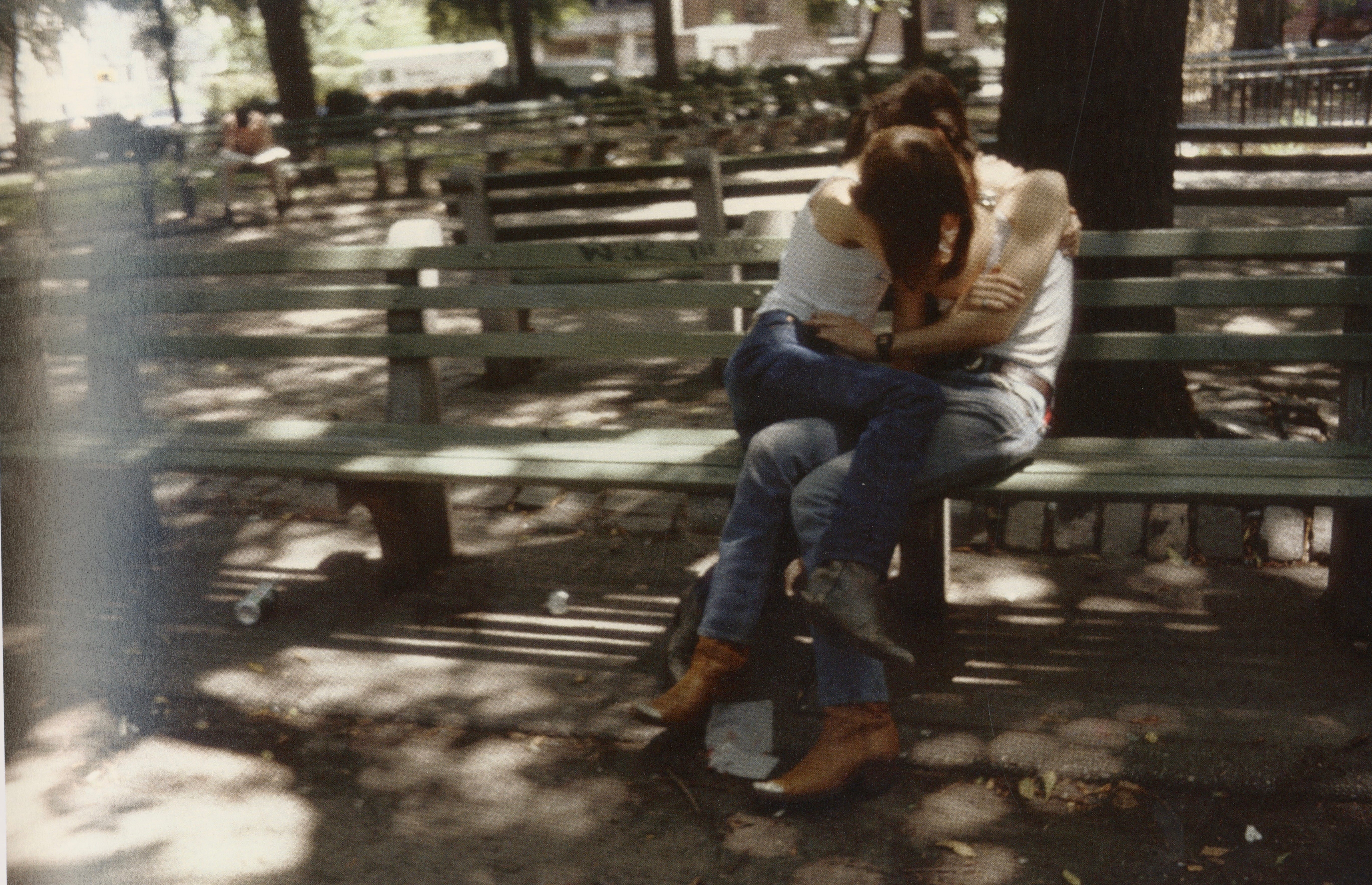 Interior spread from Nan Goldin’s “The Ballad of Sexual Dependency,” featuring full-color documentary photographs.