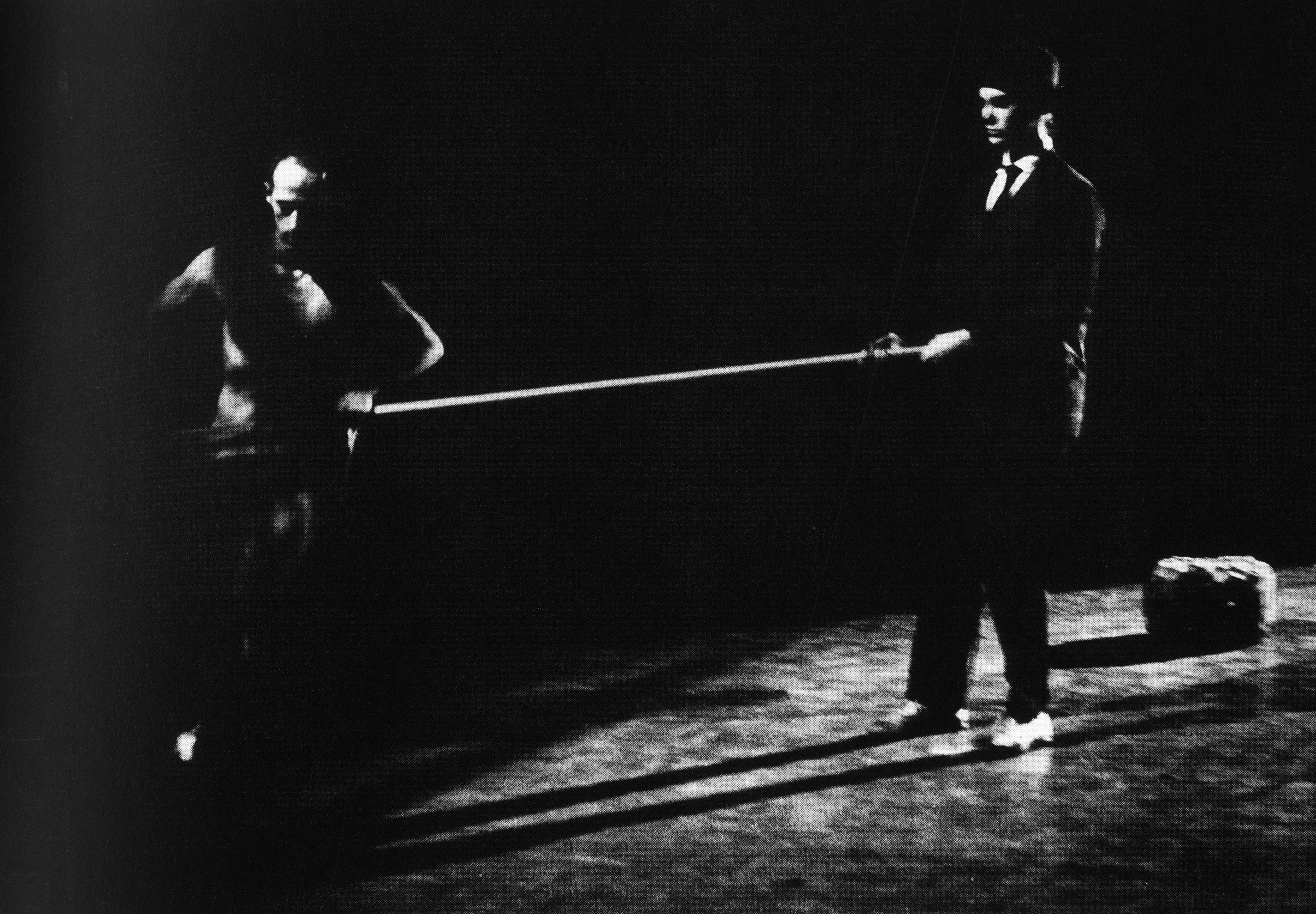 Inside spread featuring Fluxus-era performance imagery captured by Peter Moore.