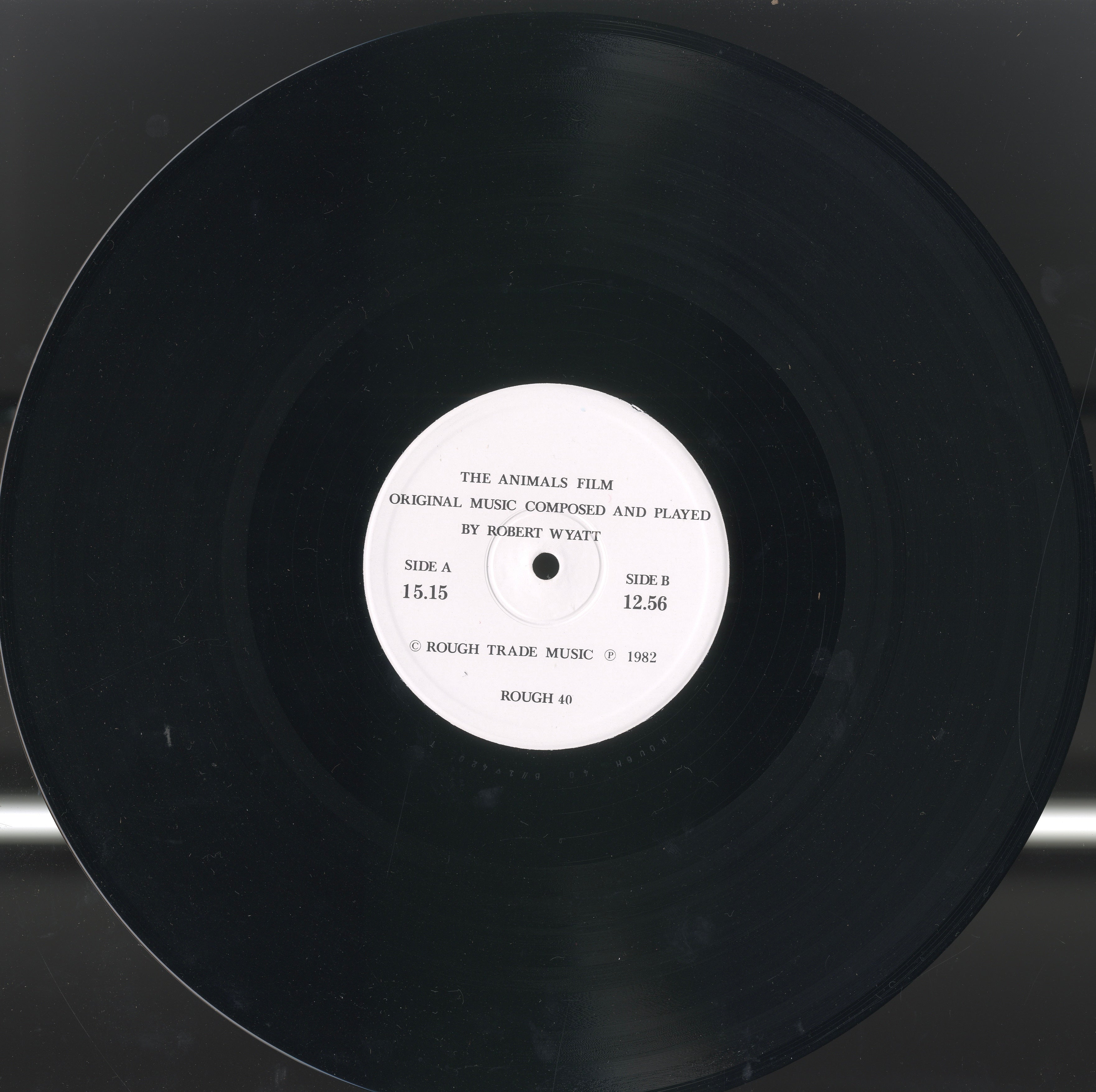Detail of Side A and Side B labels from Robert Wyatt’s The Animals Film — Italian 1982 pressing, released by Base Records.
