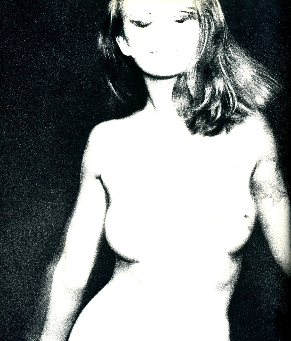 Woman with long hair in an open black coat and a cross pendant, nude figure study from November Girl, 1967.