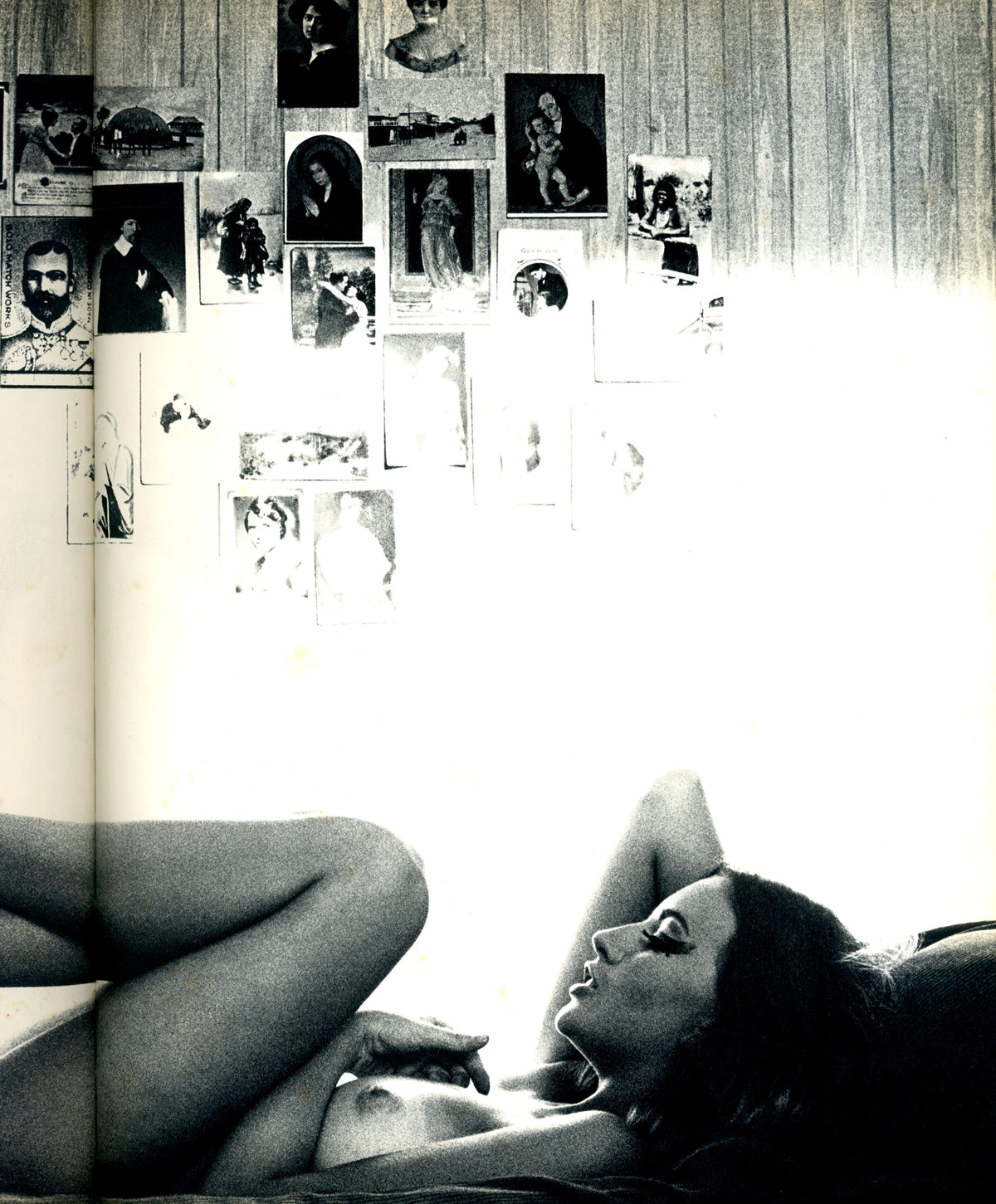 Nude figure in profile with raised arm beside a wall of pinned photographs, plate from November Girl.