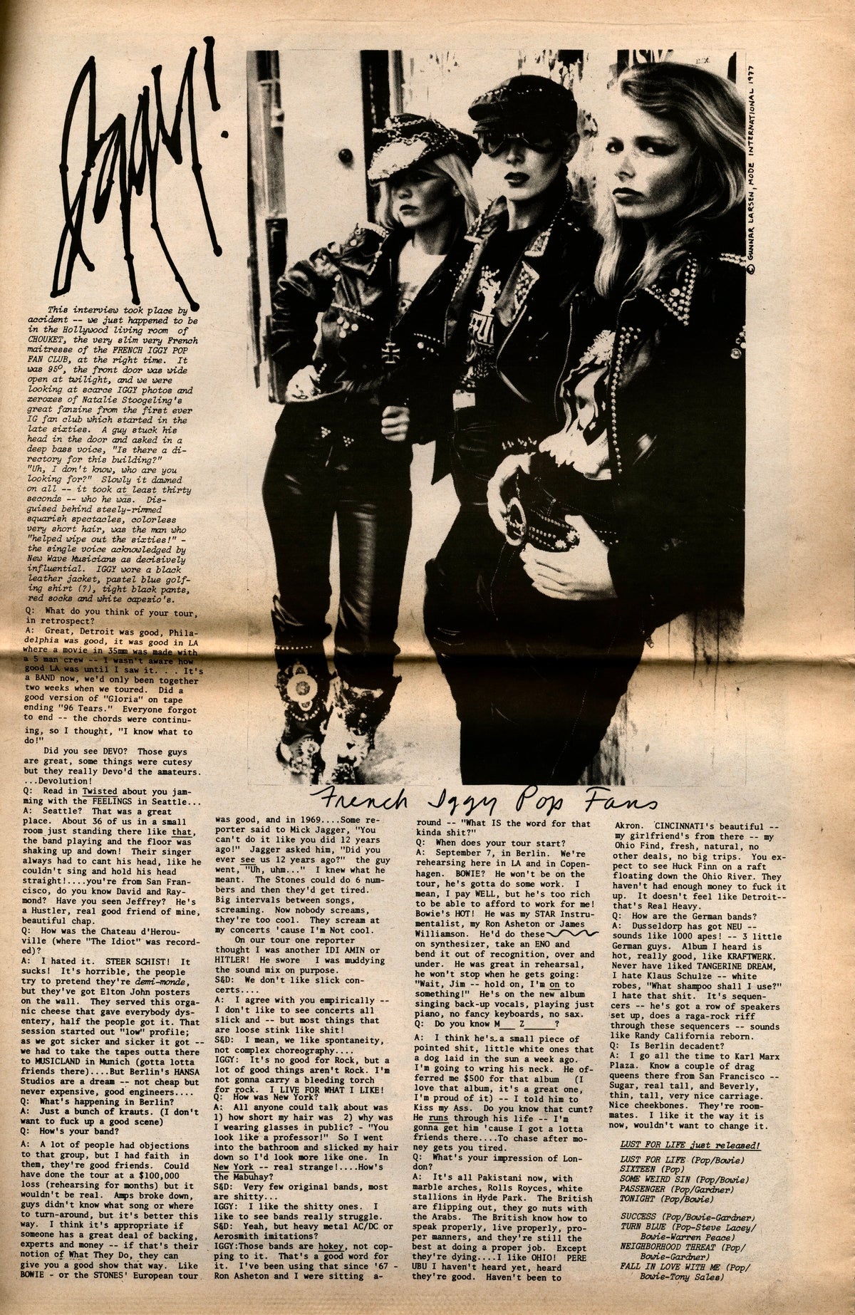 Band photographed on the street above typed columns, interior page of Search & Destroy No. 2.