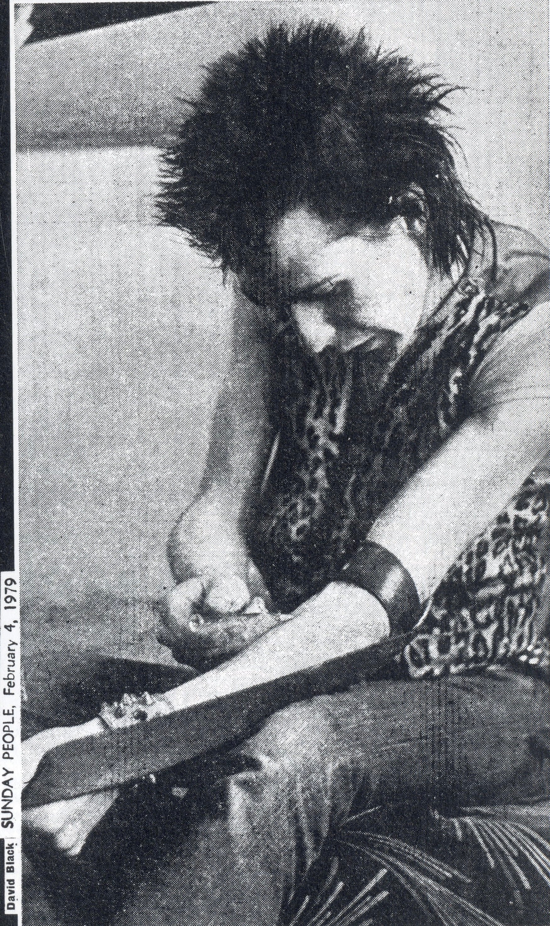 Interior image Sex Pistols band photography.