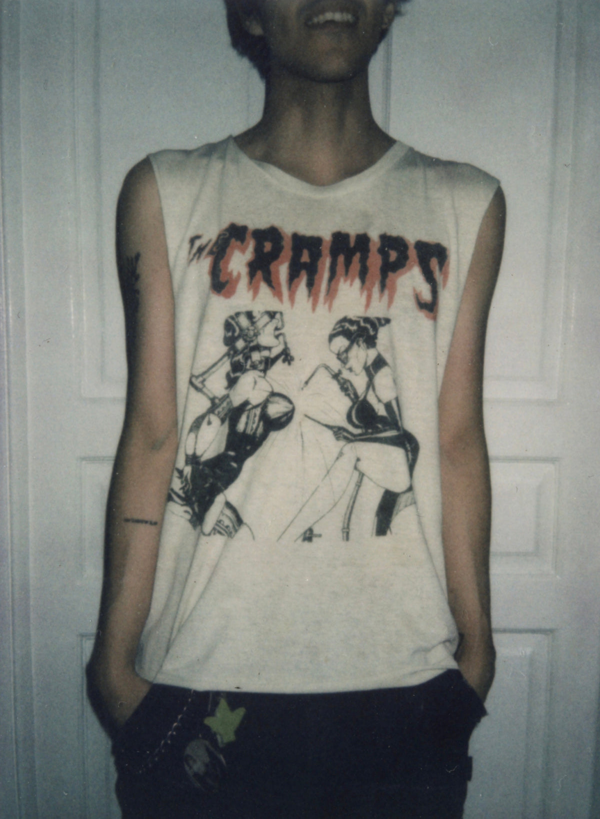 The Cramps cut-off band tee worn, front view showing the logo and illustration.