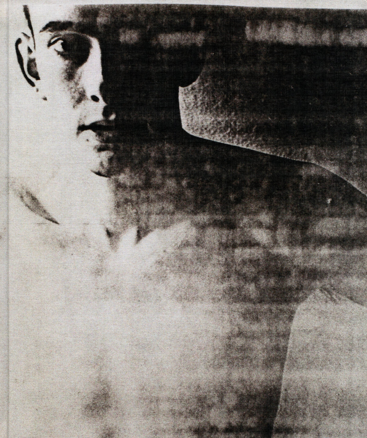 Wolfgang Tillmans: Lighter, Hatje Cantz 2008: grainy photocopy-style portrait of a young man in black and white.